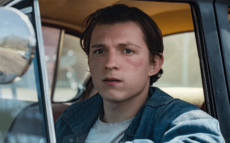 Picture of Tom Holland in the film The Devil All the Time